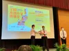Dr Liang Yong receiving his award from Mr Chan Chun Sing (Photo Credit: Lianhe Zaobao)